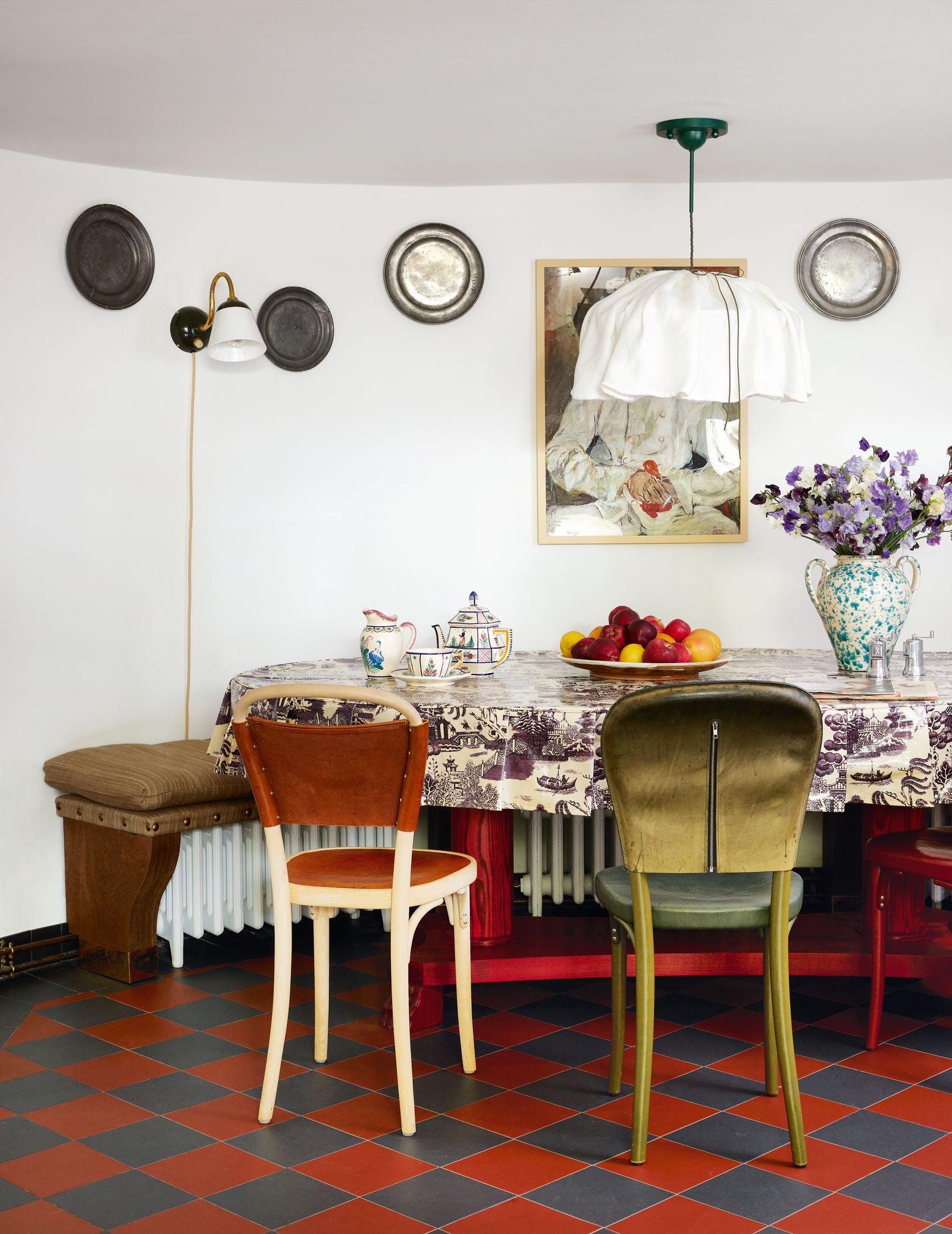 The team often gathers for meals or informal meetings in this space in the basement. It's where the communal men's loos...