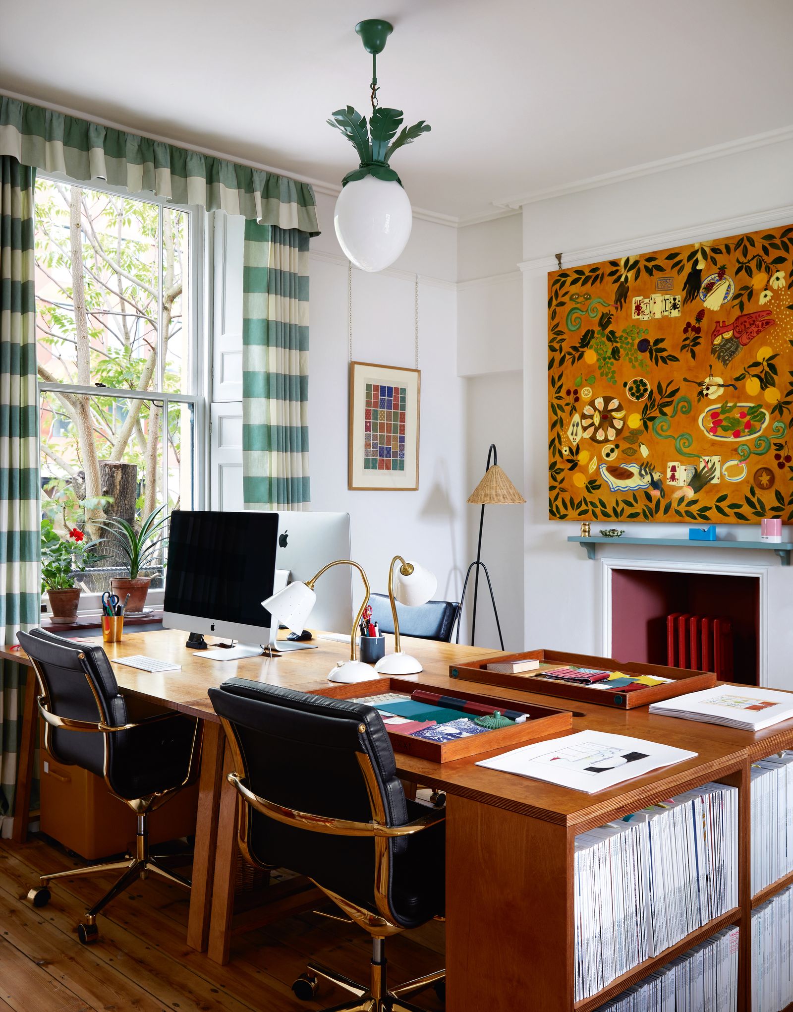 Occupying what would have been a bedroom on the first floor Beata's office has walls lined with the designers nostalgic...