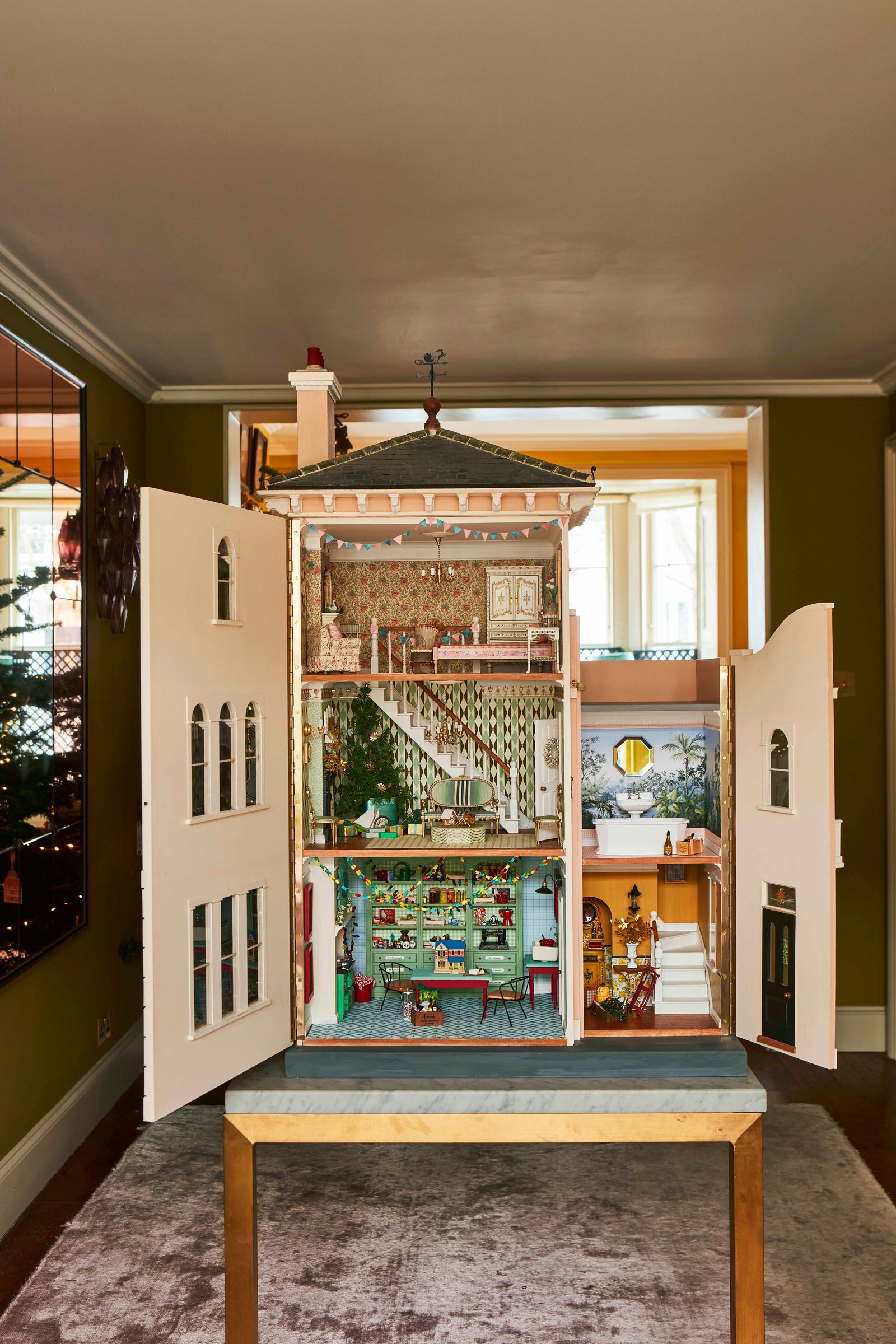 The intricate decoration of a magical Christmas doll's house