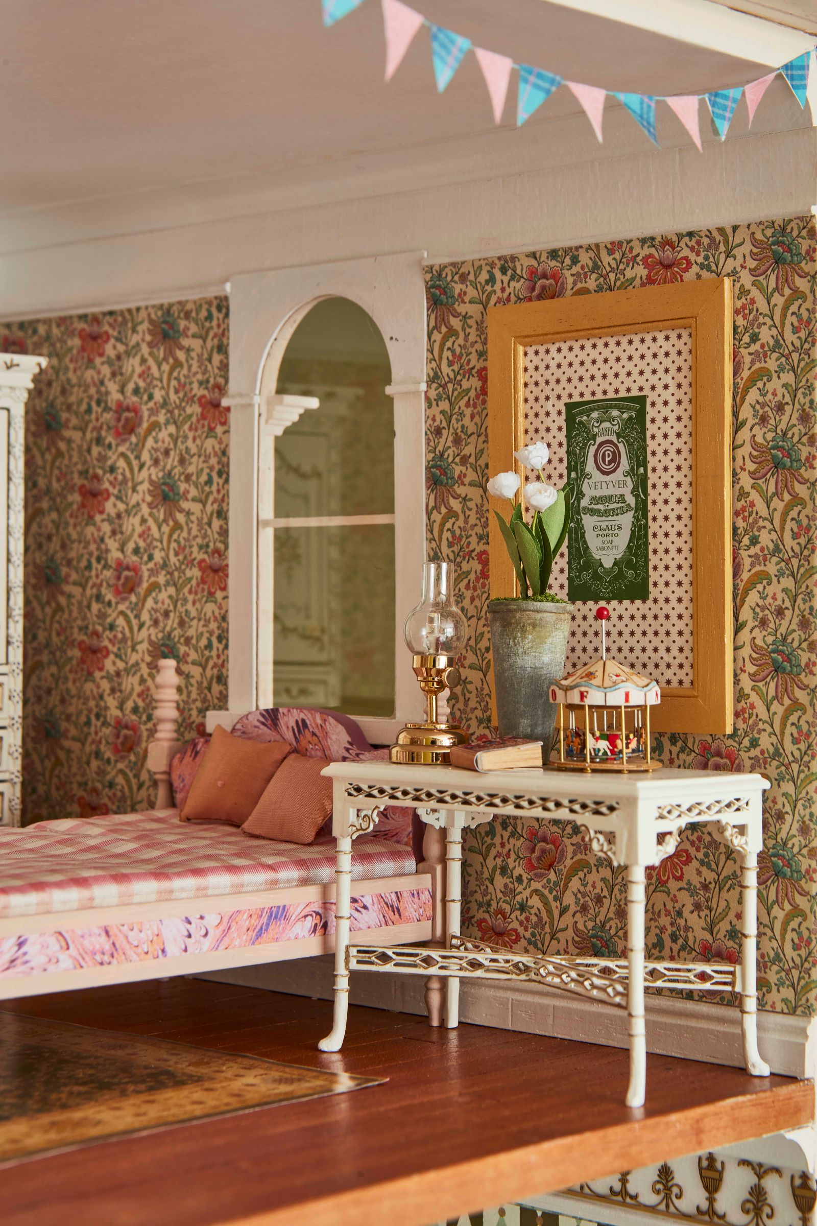 The intricate decoration of a magical Christmas doll's house