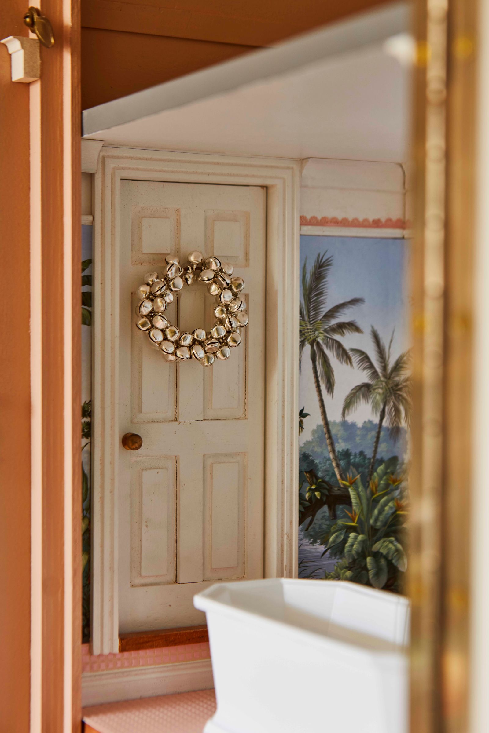 The intricate decoration of a magical Christmas doll's house