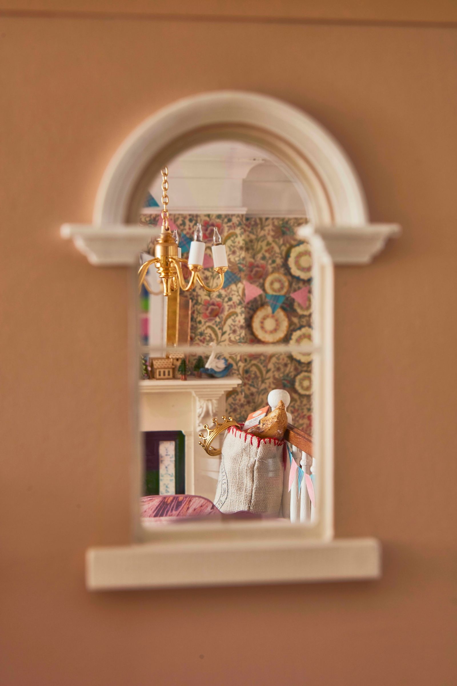 The intricate decoration of a magical Christmas doll's house