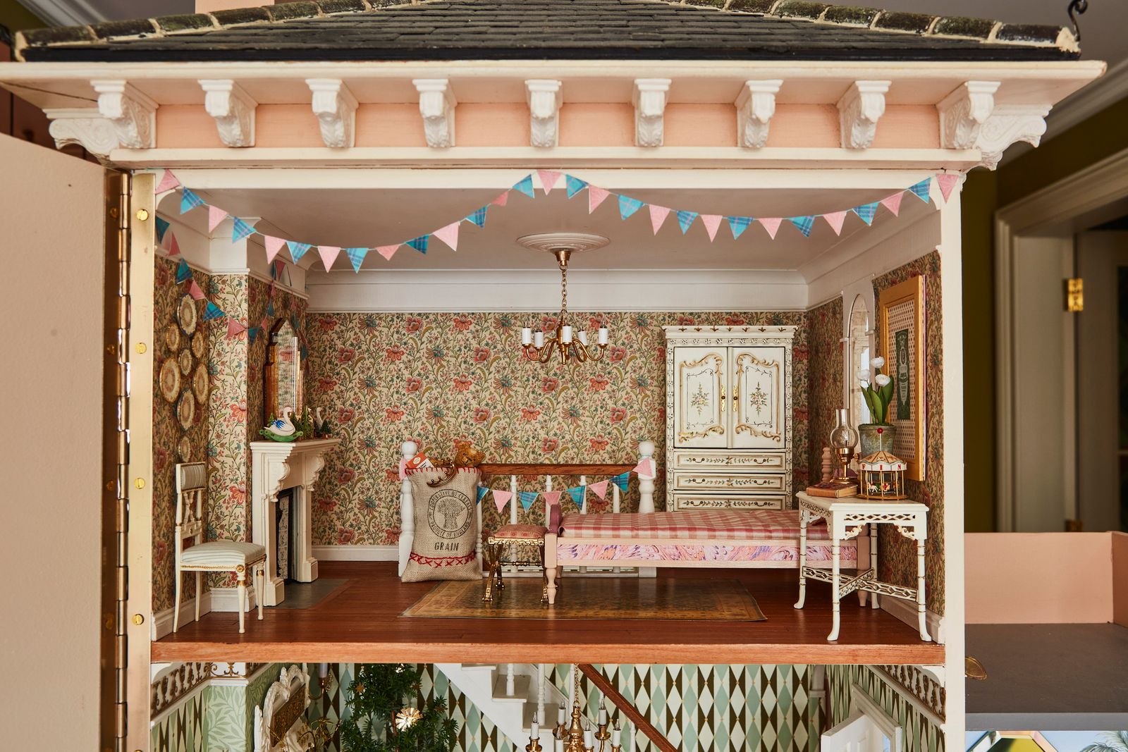 The intricate decoration of a magical Christmas doll's house