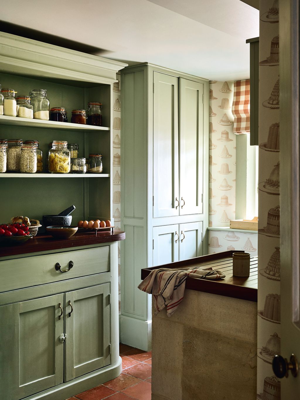 In the pantry of the same house Anna has used Cooking Apple Green by Farrow  Ball  an appropriate choice given the...