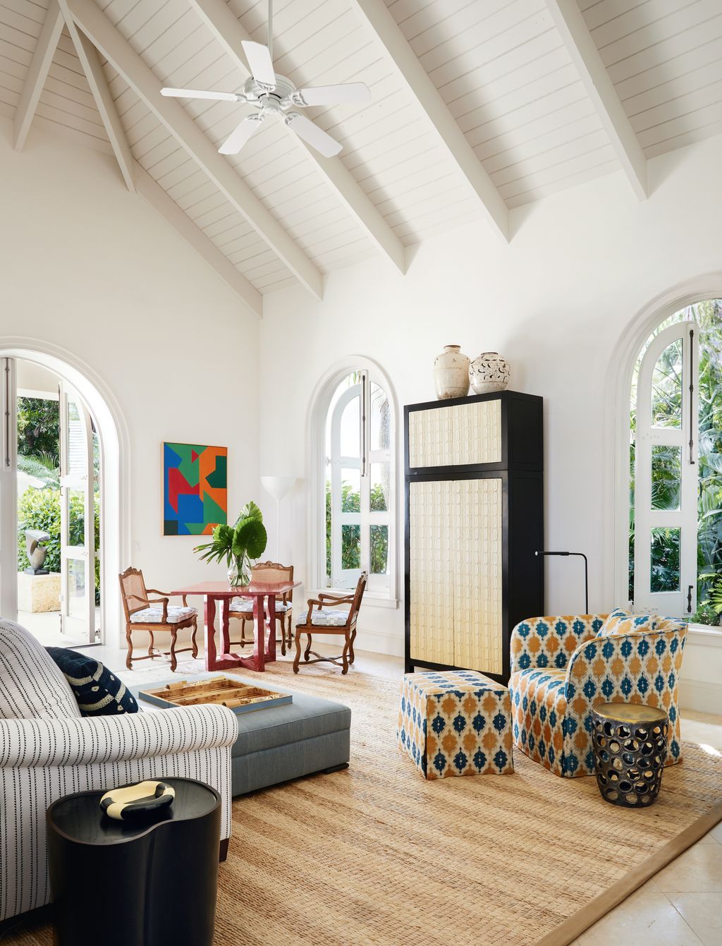 An armchair and footstool in TylerGraphic's ‘Tunis fabric completes the picture in the sitting room.