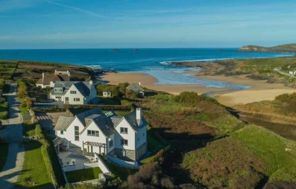 This house is generous in every way with large rooms and enough space to sleep 12 guests a sweeping garden overlooking...