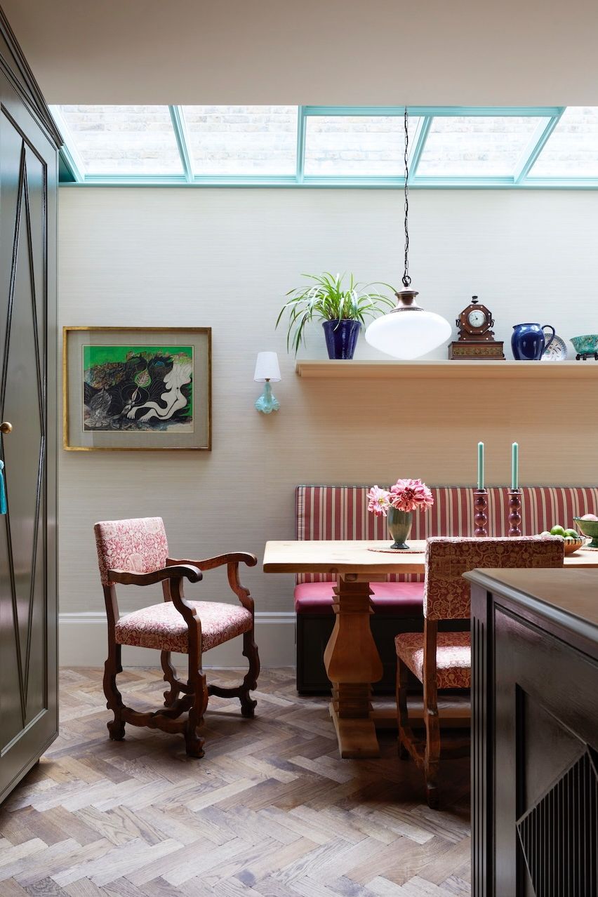 The dining area of this flat designed by Laura Stephens had to be able to fit the owners many grand children and...