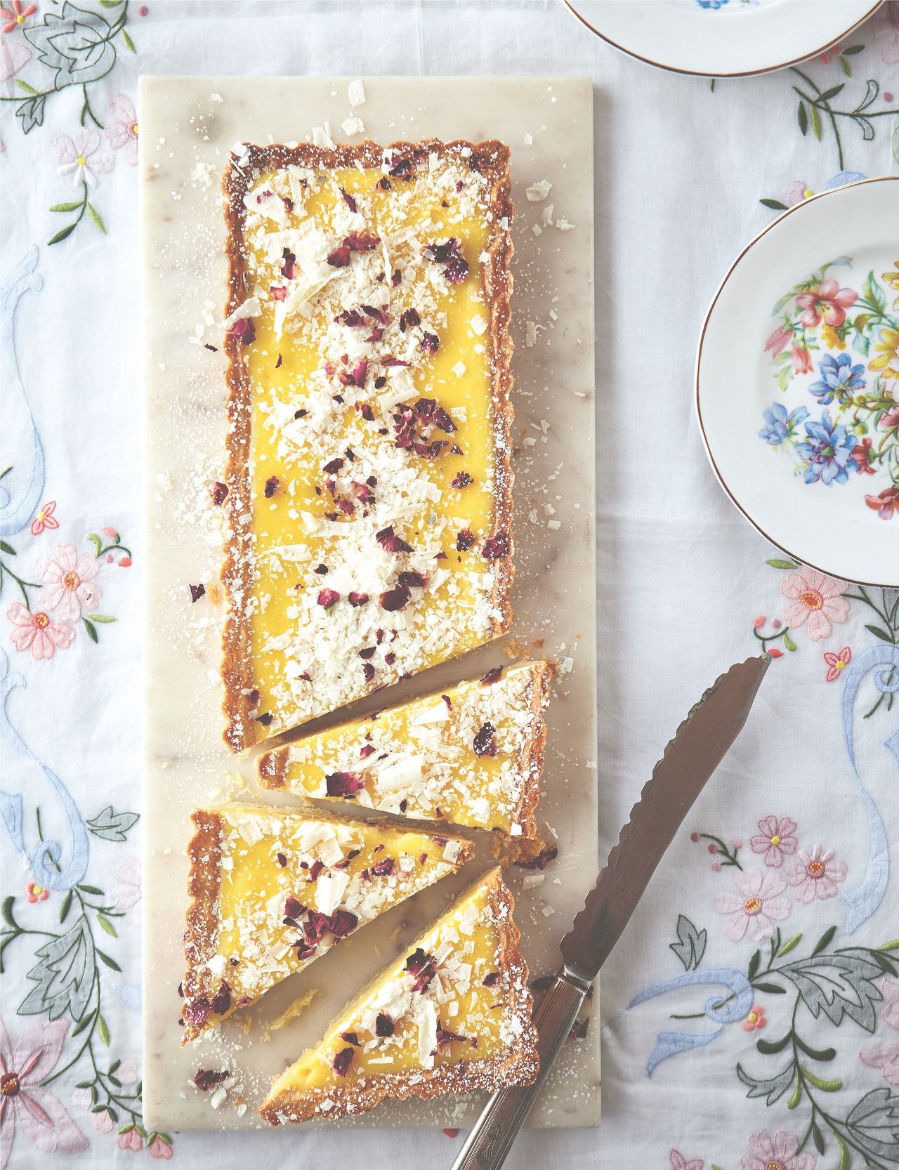 Image may contain Blade Knife Weapon Plate Food Bread Food Presentation and Dessert