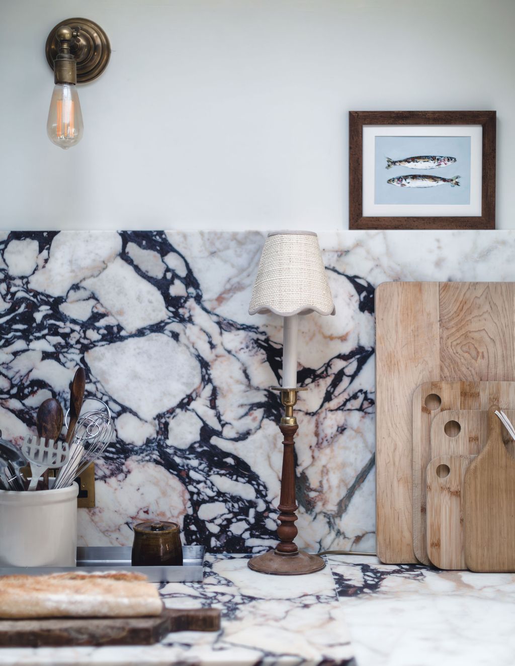 Image may contain Lamp Art Painting Cup Bread Food Indoors and Interior Design