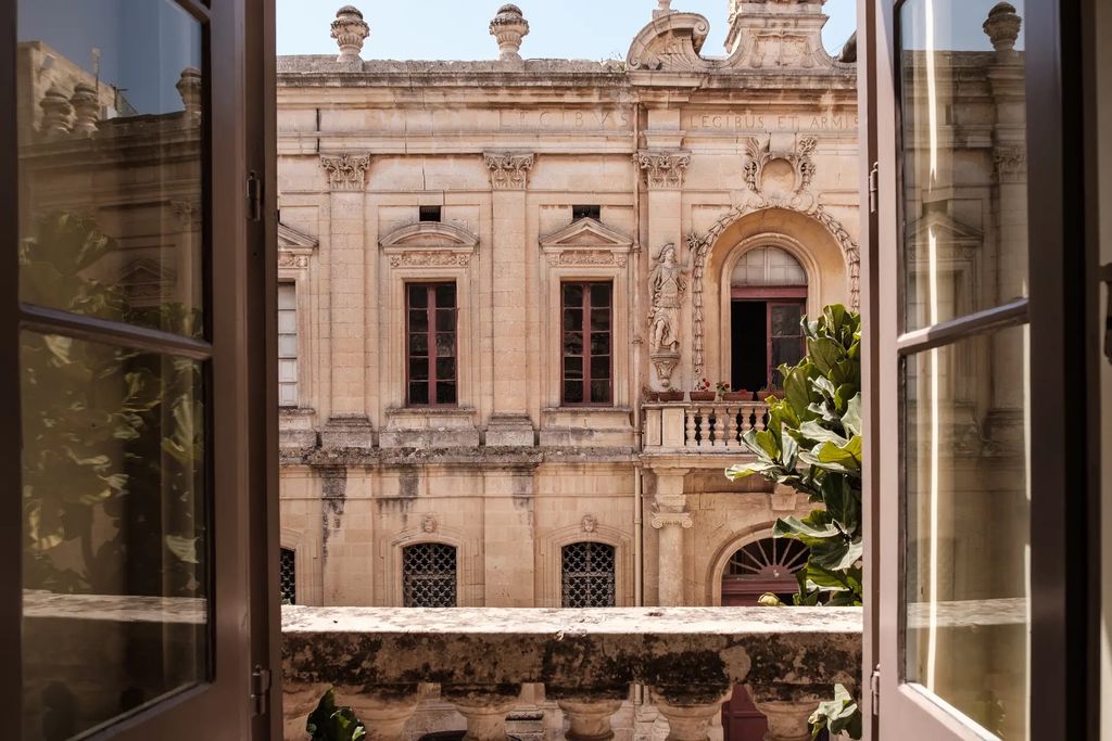 Image may contain Indoors Interior Design Person Architecture Building House Housing and Villa