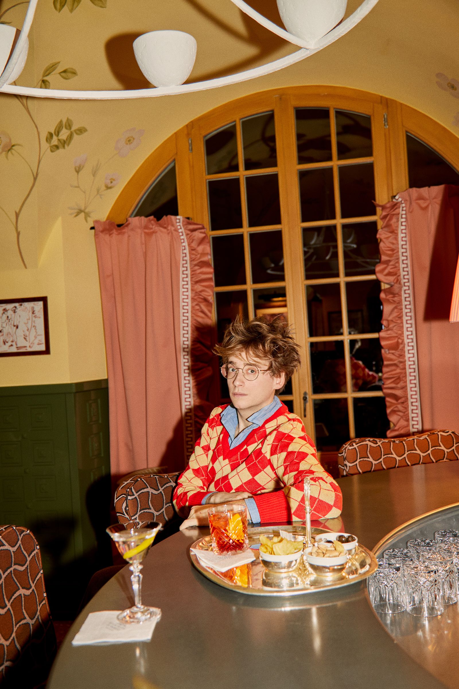 Image may contain Evan Osnos Architecture Building Dining Room Dining Table Furniture Indoors Room Table and Food