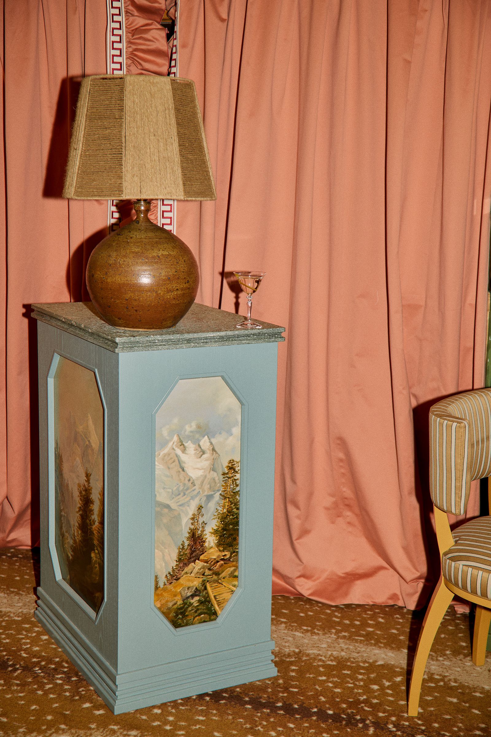 Image may contain Lamp Chair Furniture and Table Lamp