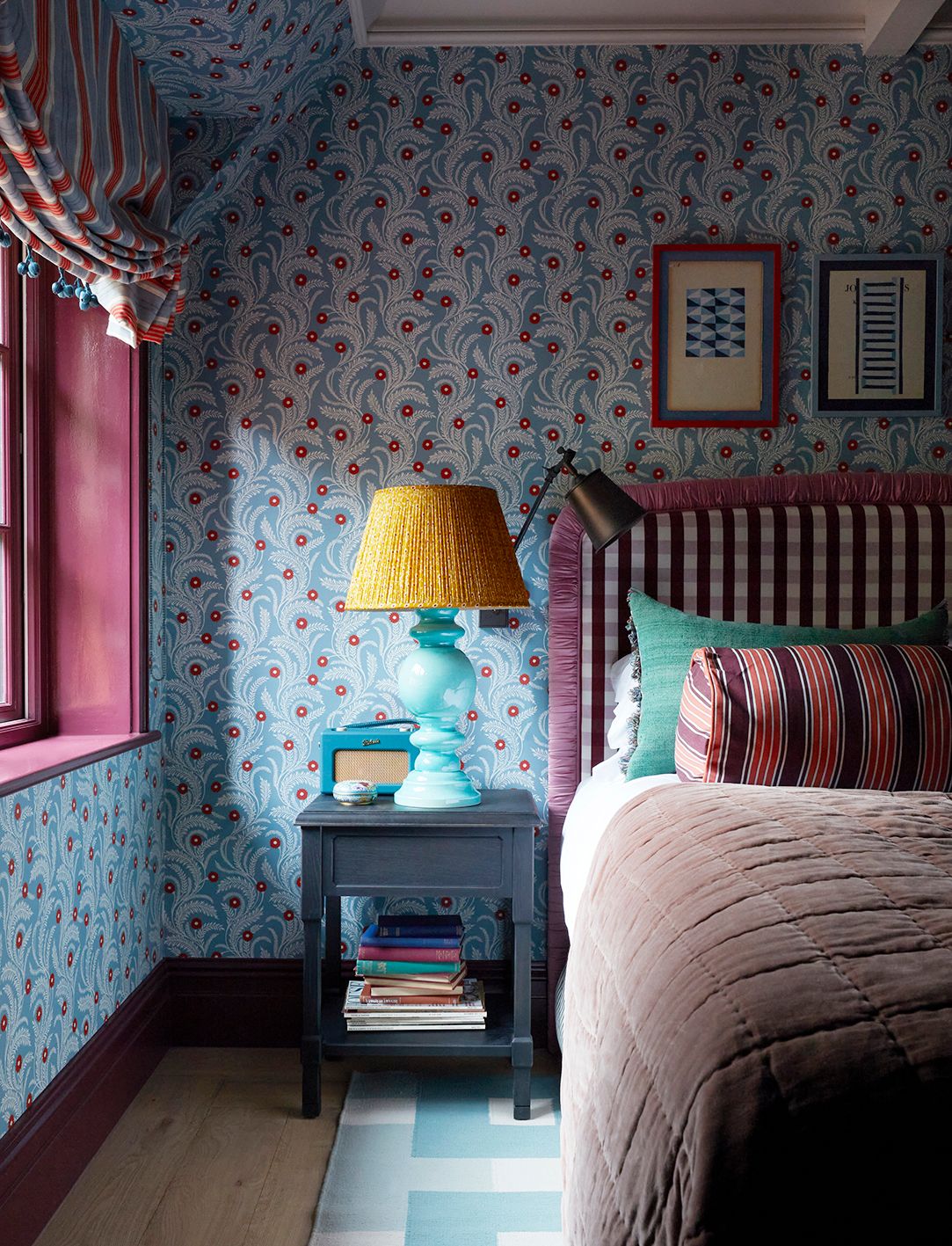 Image may contain Lamp Bed Furniture Home Decor Table Lamp Bedroom Indoors Room Dorm Room Cushion and Art