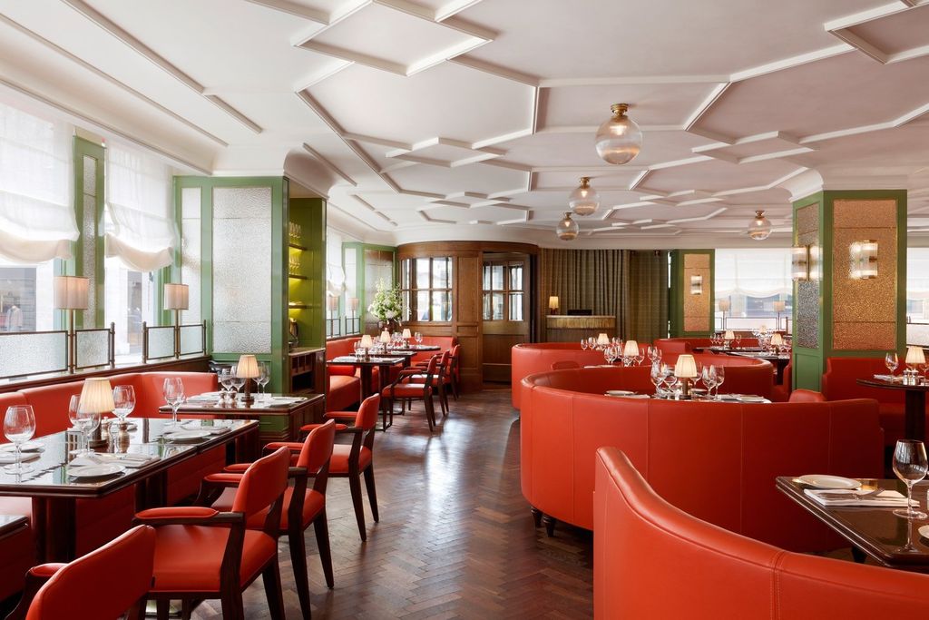 Image may contain Indoors Restaurant Dining Table Furniture Table Architecture Building Dining Room and Room