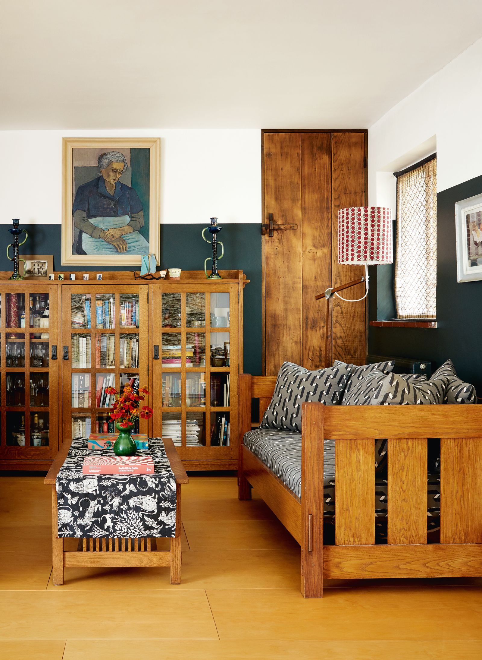 Image may contain Indoors Interior Design Wood Art Painting Hardwood Stained Wood Furniture and Architecture