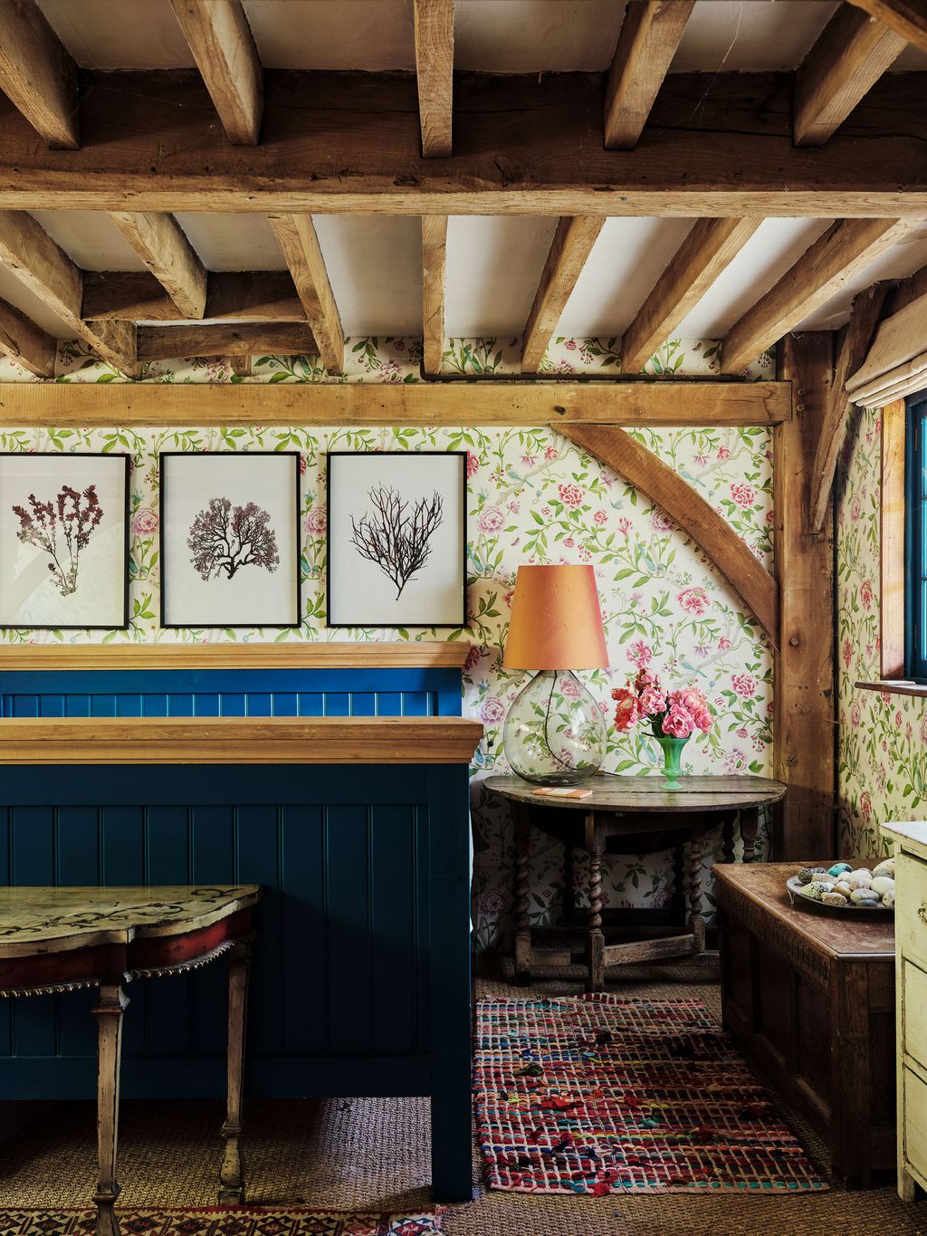 Image may contain Indoors Interior Design Wood Lamp Desk Furniture Table Art Painting Home Decor and Plate