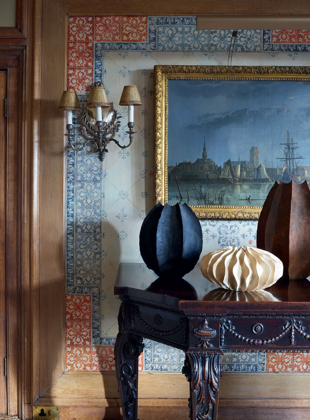 Image may contain Lamp Art Painting Indoors Interior Design and Chandelier