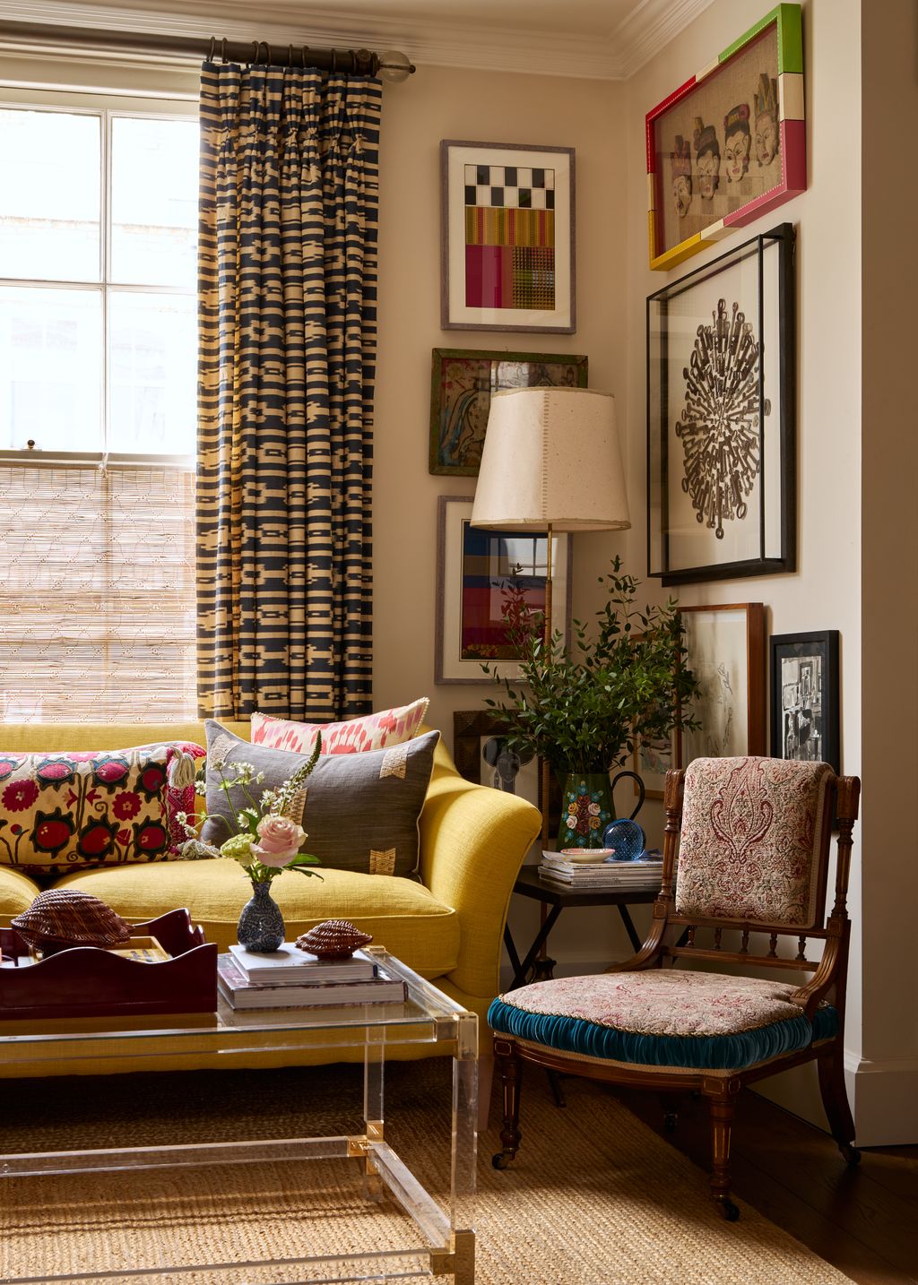 Image may contain Home Decor Chair Furniture Couch Architecture Building Indoors Living Room Room and Cushion