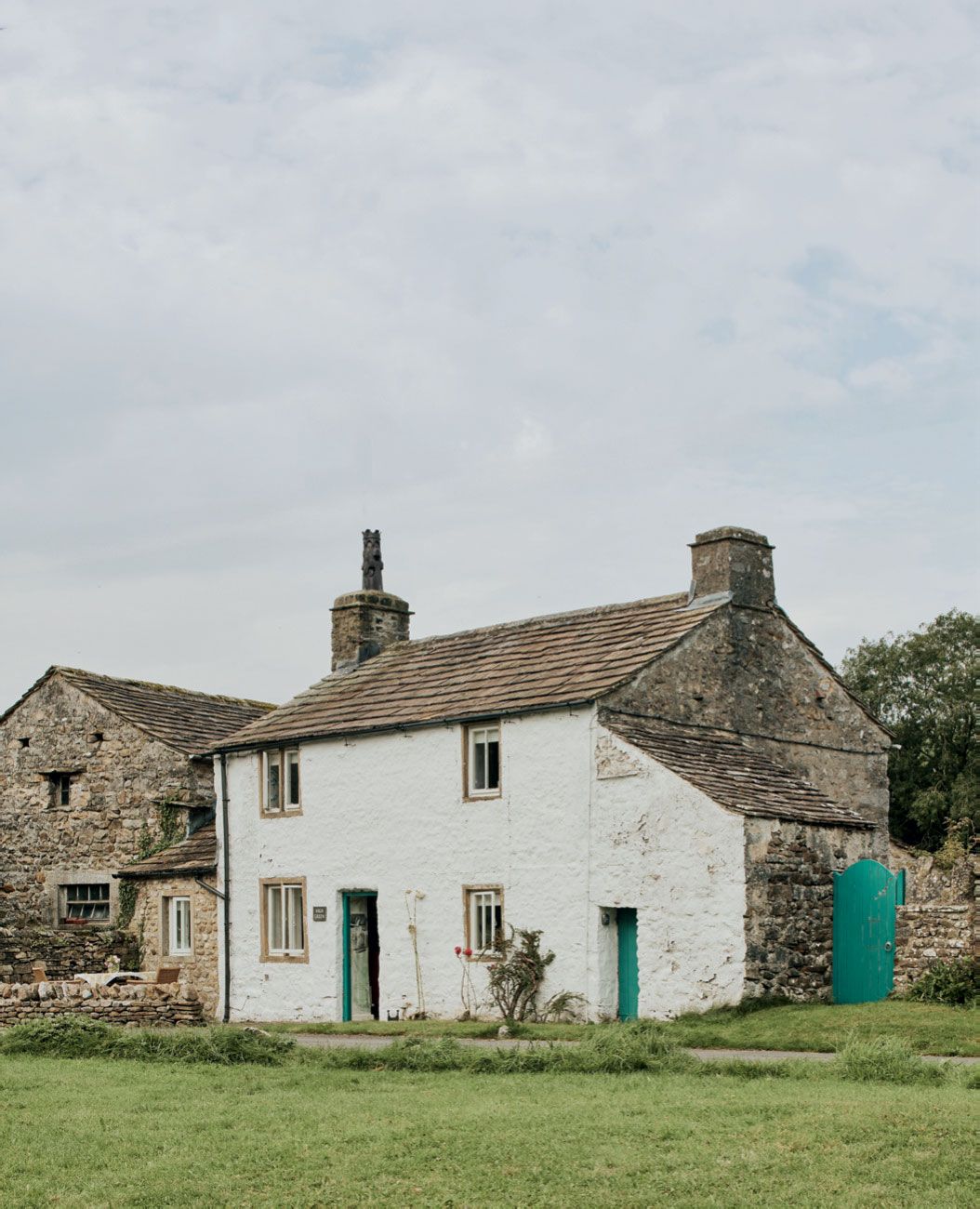 Image may contain Architecture Building Housing House Cottage Manor Outdoors and Nature