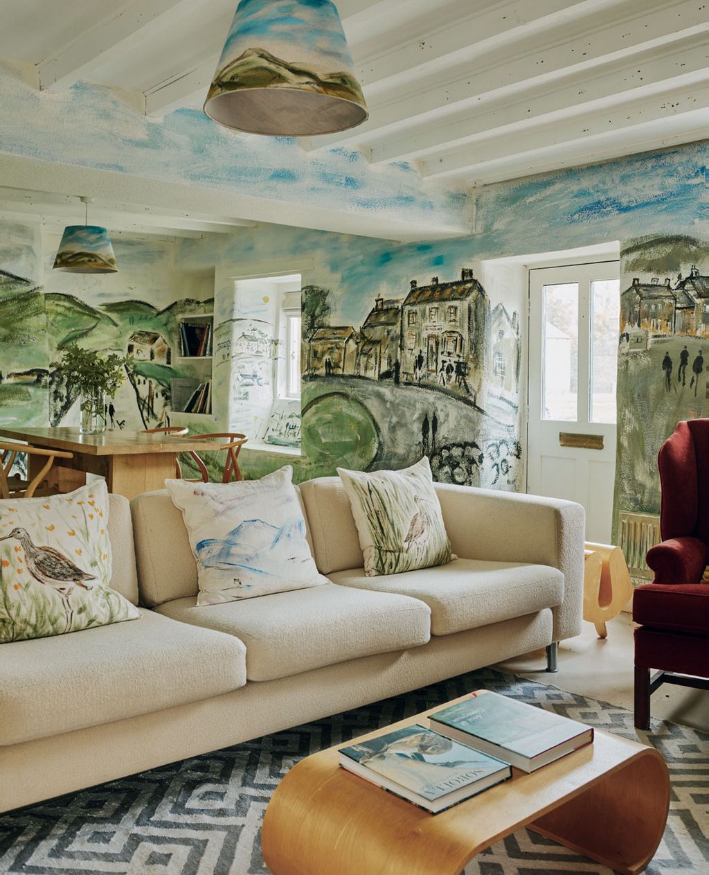 Image may contain Home Decor Architecture Building Furniture Indoors Living Room Room Couch Book and Publication