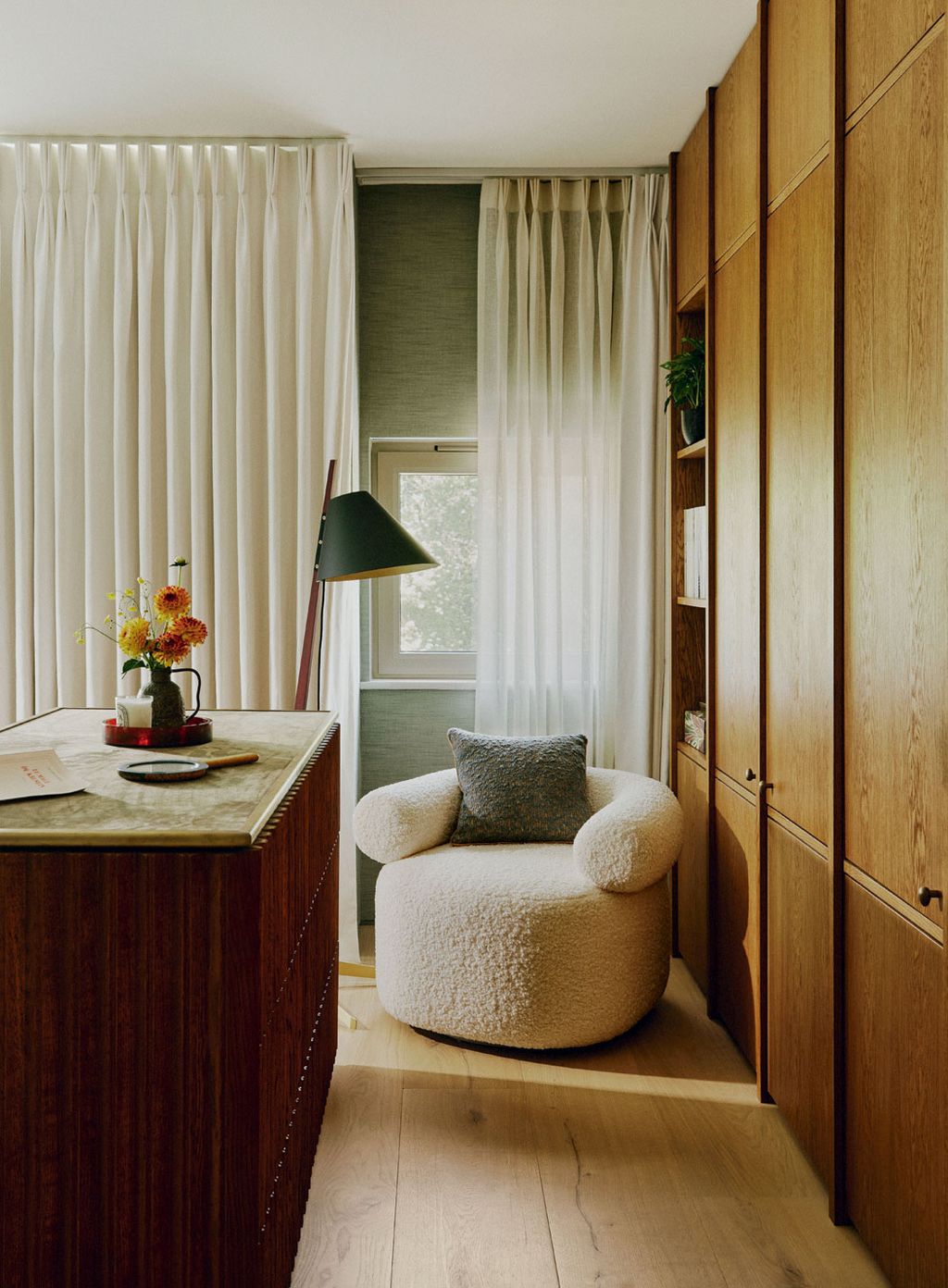 Image may contain Indoors Interior Design Plant Furniture Couch Lamp Home Decor and Plate