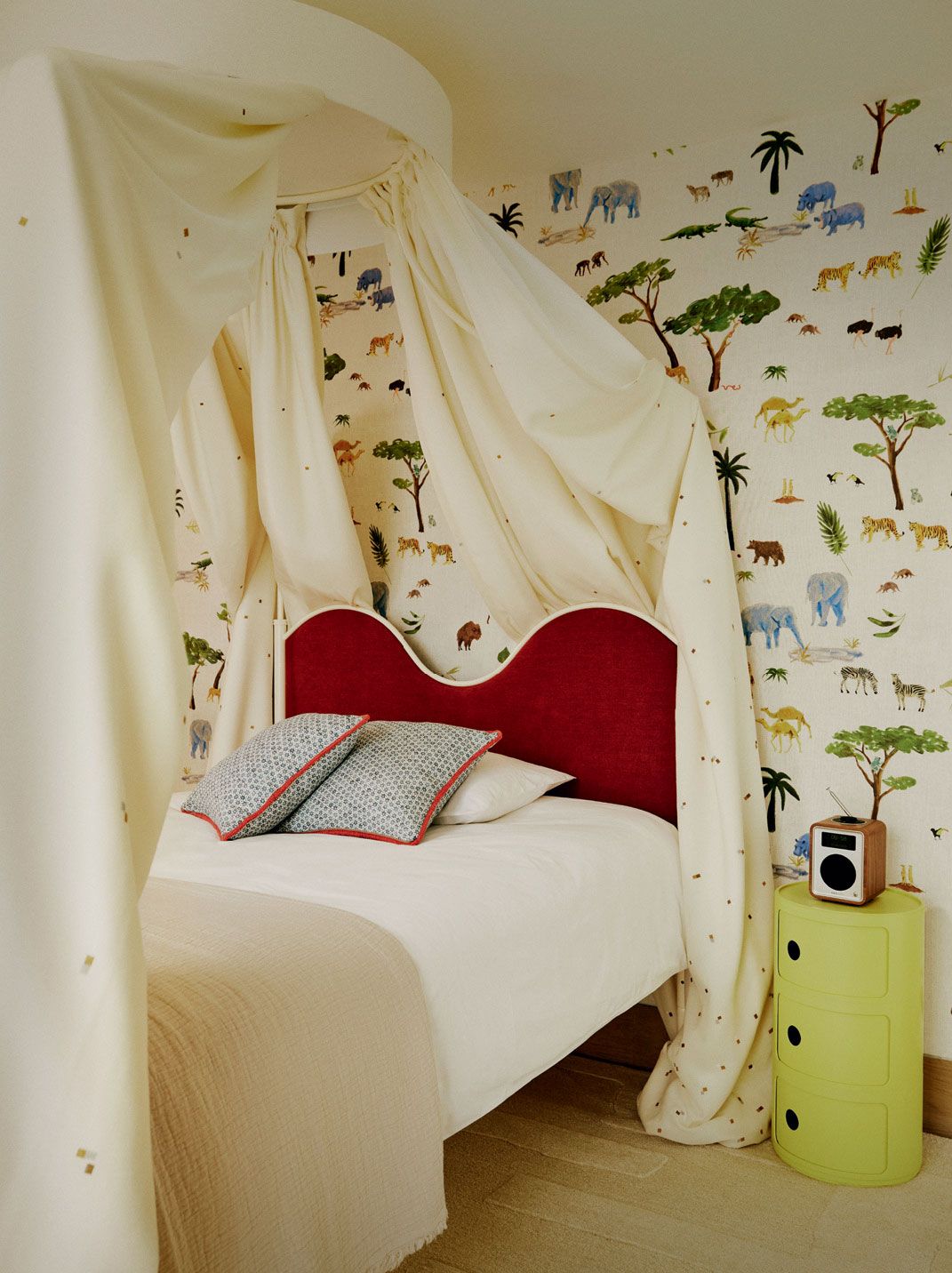 Image may contain Furniture Indoors Bed Bedroom Room Plant Electronics Speaker and Canopy Bed