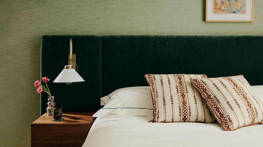 Image may contain Cushion Home Decor Indoors Interior Design Pillow Bed Furniture Cup Art Painting and Lamp