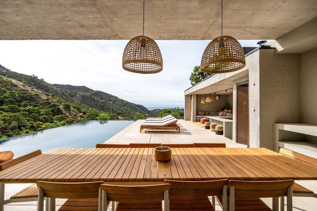 Image may contain Nature Outdoors Scenery Lamp Wood Chair Furniture Indoors Interior Design Desk and Table