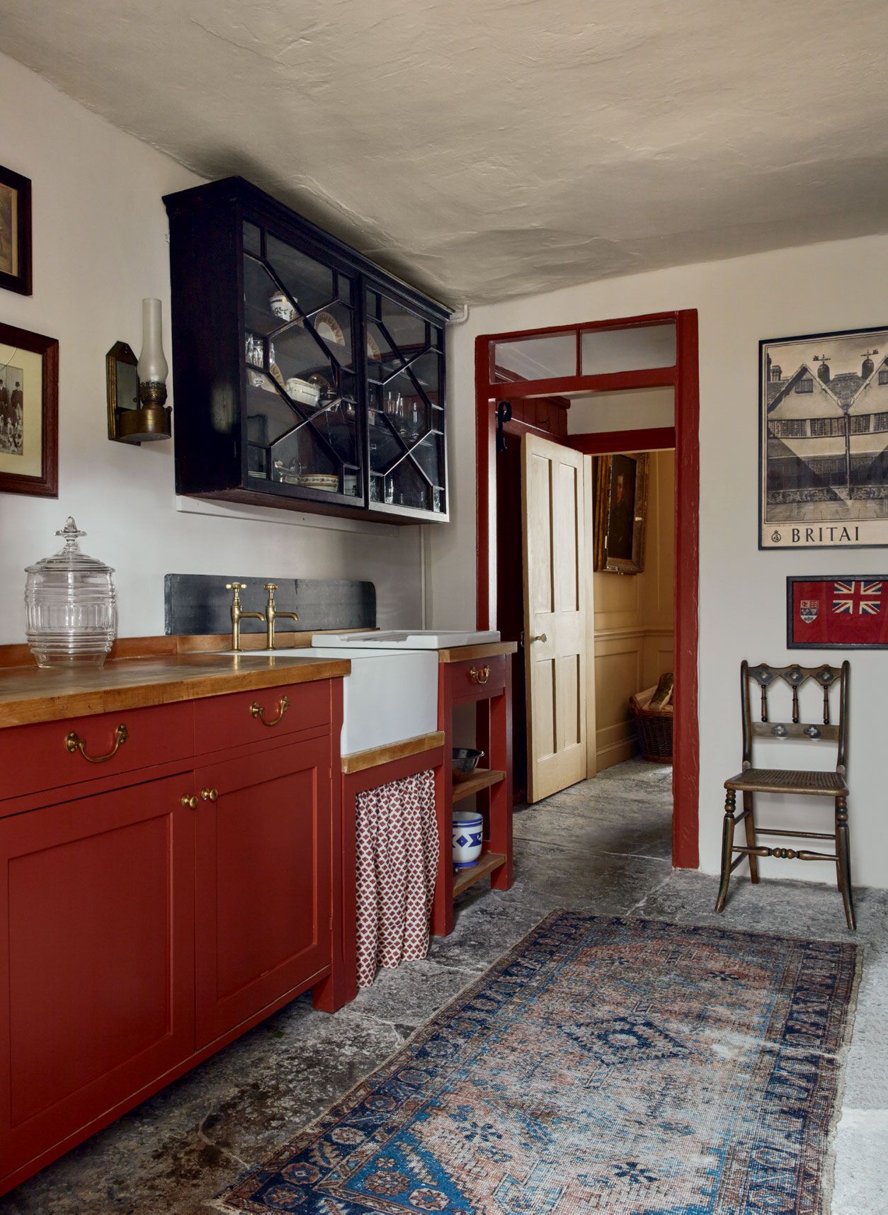 Image may contain Home Decor Chair Furniture Rug Indoors Interior Design Art Painting Kitchen Floor and Lamp