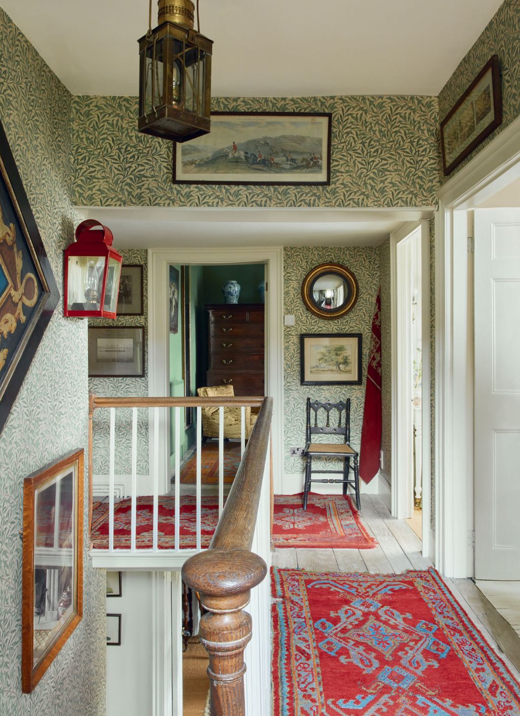 Image may contain Chair Furniture Indoors Art Painting Lamp Architecture Building Foyer Home Decor and Rug