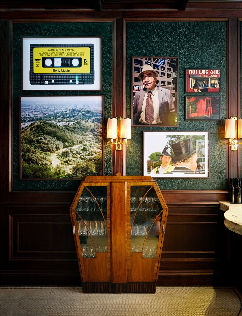 Image may contain Crowd Person Adult Accessories Formal Wear Tie Clothing Hat Lamp Art Painting and Audience