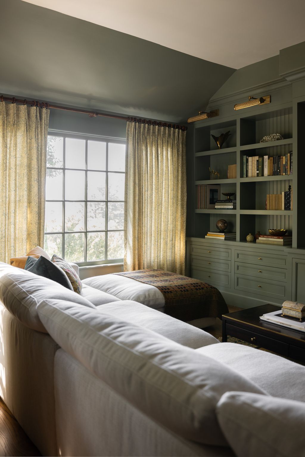 Image may contain Indoors Interior Design Furniture Bed Couch Home Decor Lamp Window Architecture and Building