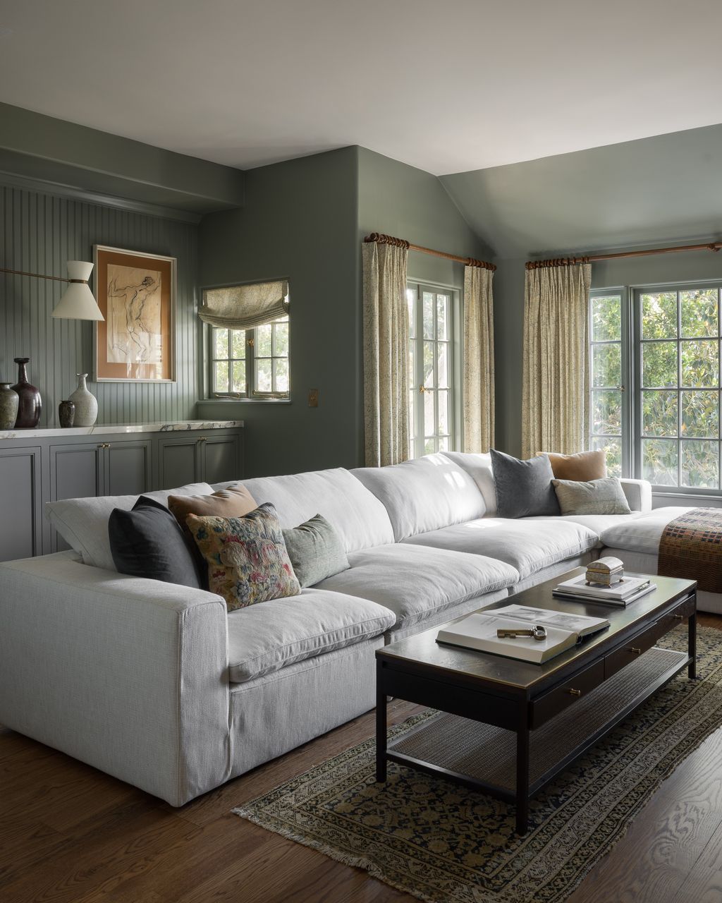 Image may contain Couch Furniture Home Decor Table Coffee Table Architecture Building Indoors Living Room and Room