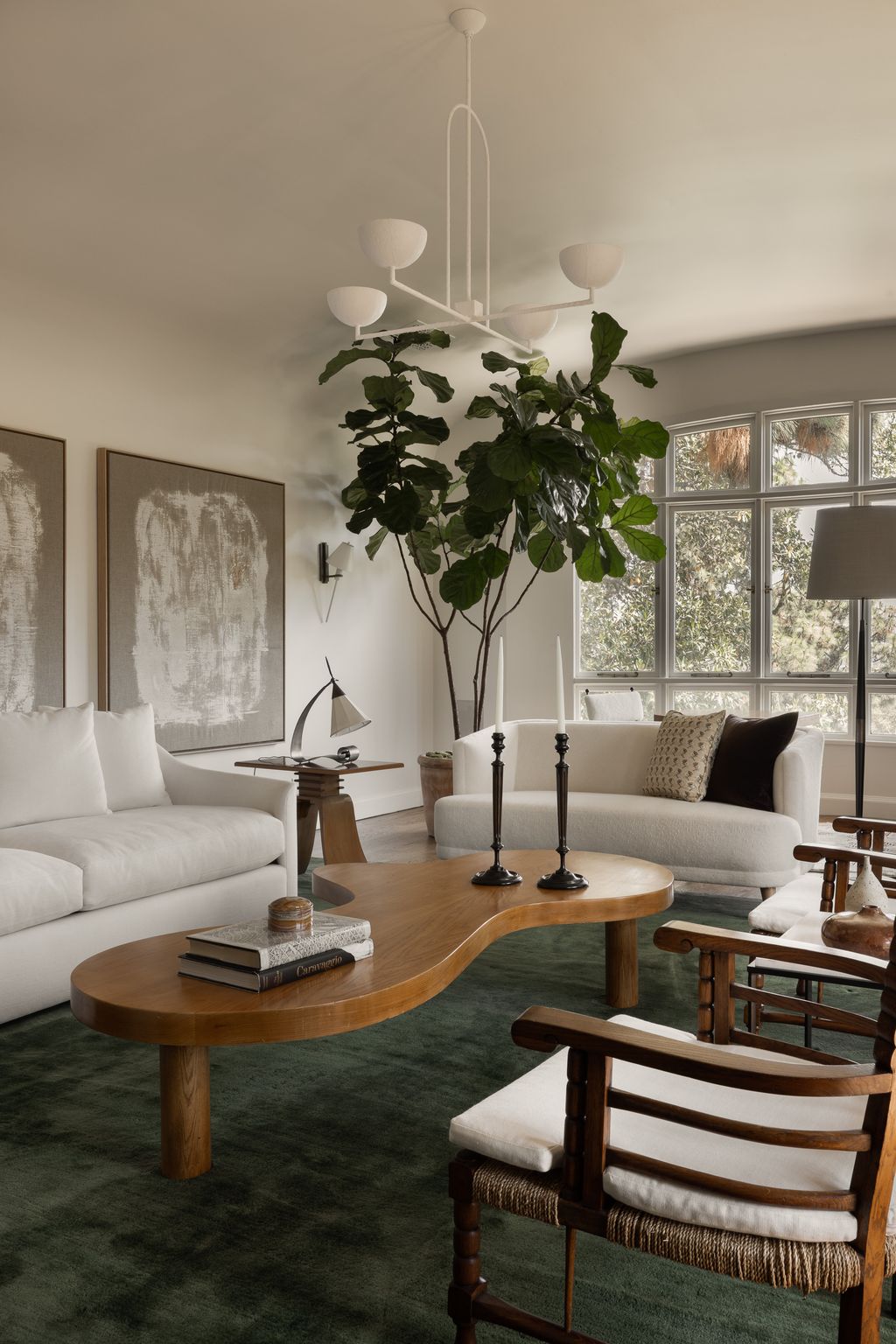 Image may contain Furniture Table Coffee Table Home Decor Architecture Building Indoors Living Room Room and Chair