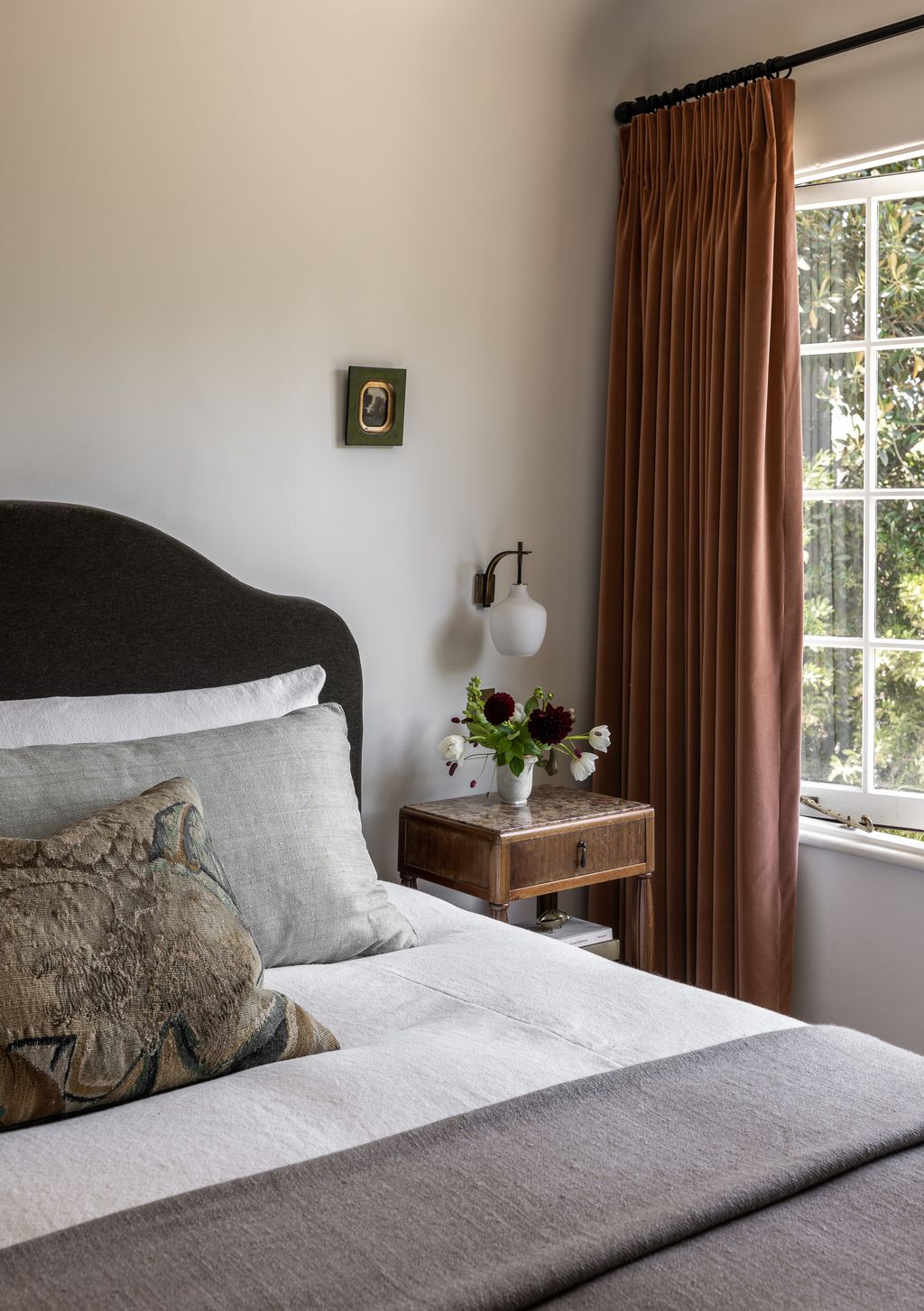 Image may contain Cushion Home Decor Lamp Indoors Interior Design Bed Furniture Art Painting Pillow and Bedroom