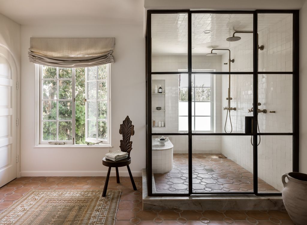 Image may contain Indoors Interior Design Home Decor Rug Door Window French Window Chair and Furniture