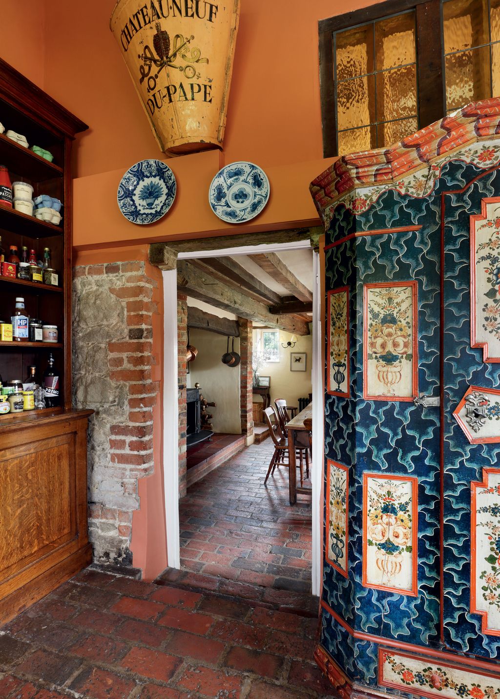 Image may contain Floor Indoors Interior Design Flooring Art Painting Plate Shelf Chair Furniture and Urban