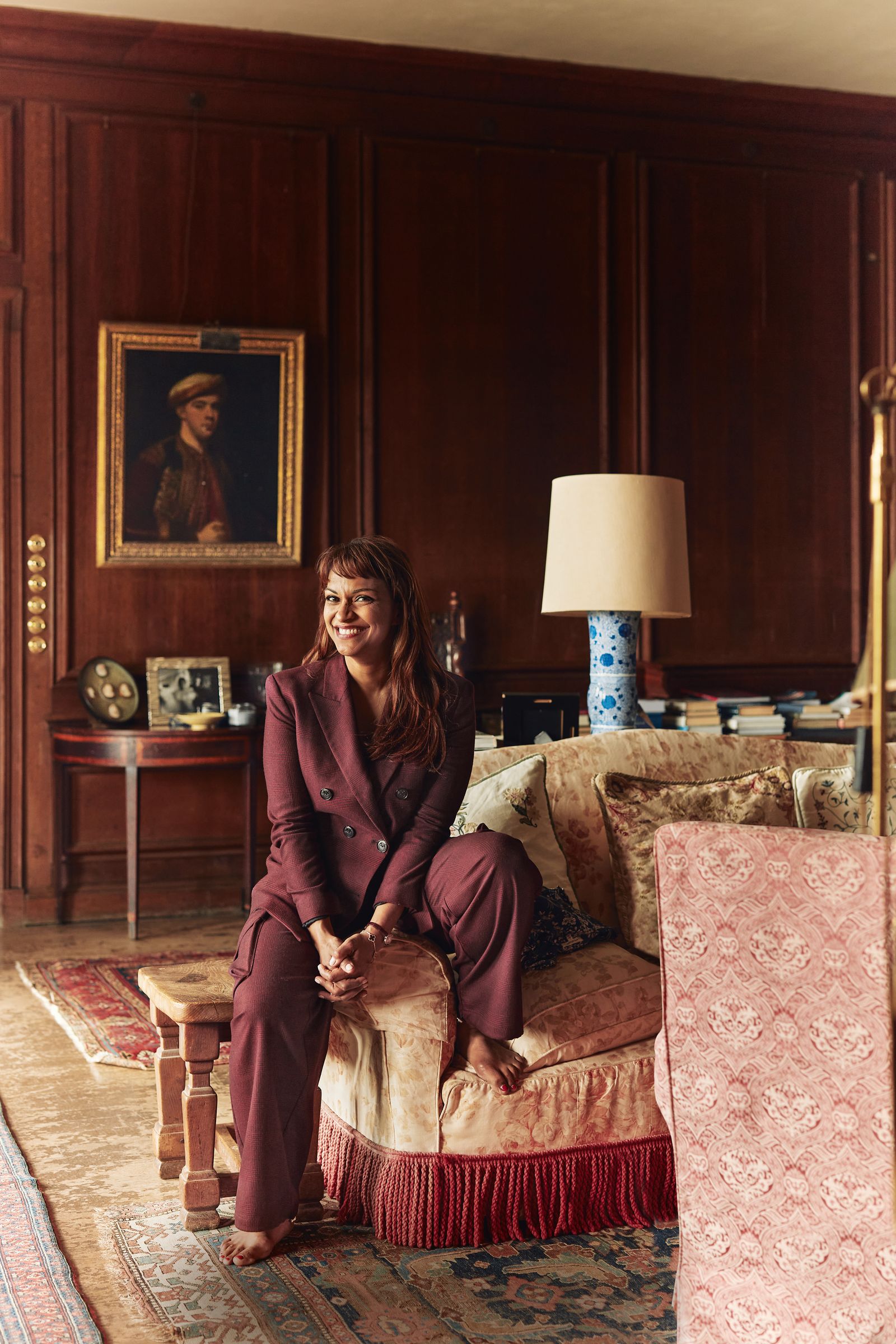 Image may contain Danielle de Niese Lamp Architecture Building Furniture Indoors Living Room Room Adult and Person