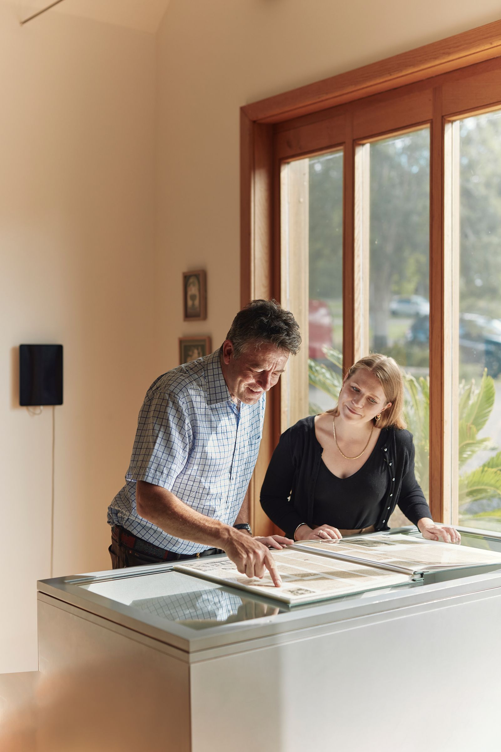 Image may contain Annegret Dietrich Furniture Table Adult Person Electronics Speaker Accessories and Jewelry