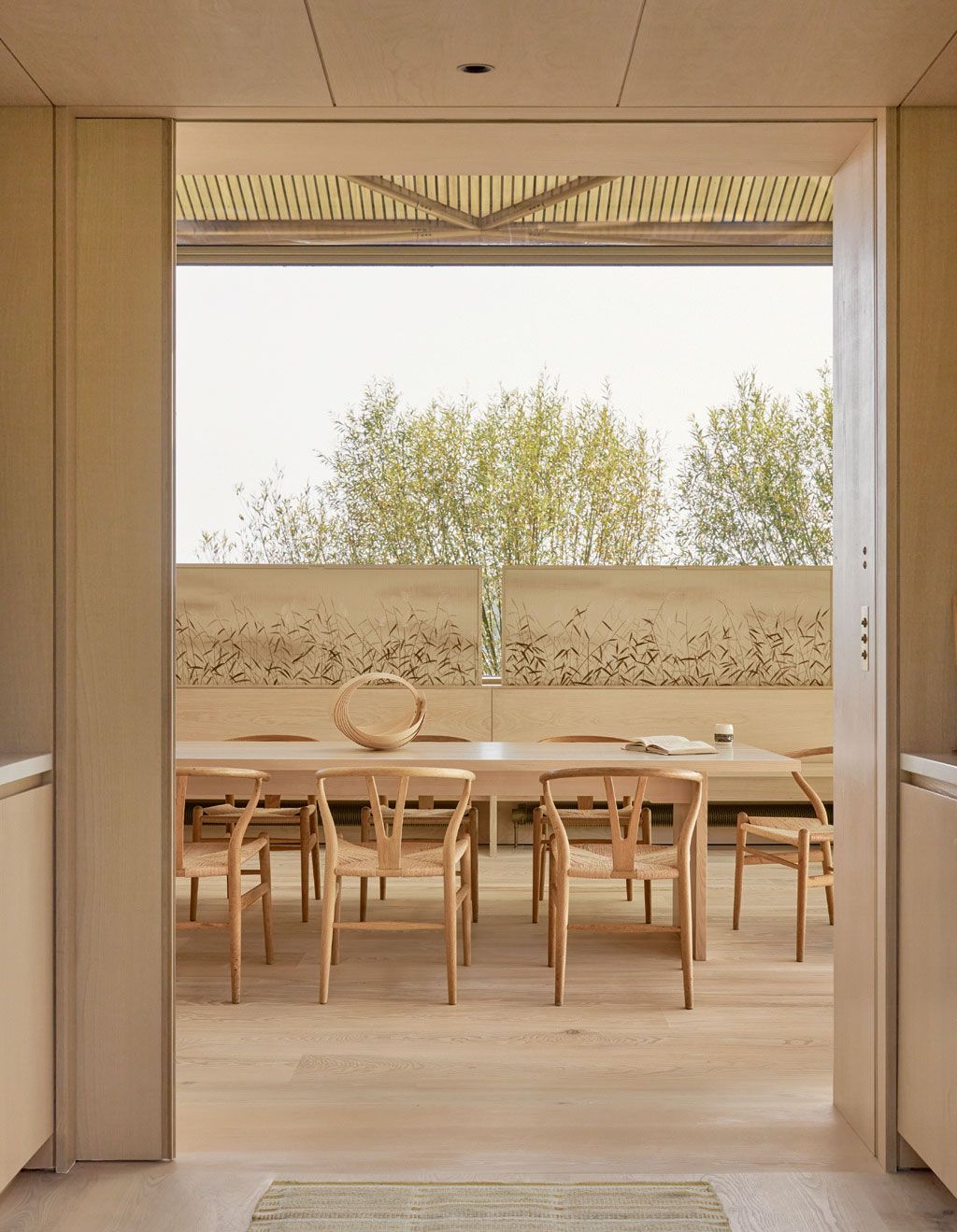 Image may contain Indoors Interior Design Dining Table Furniture Table Architecture Building Dining Room and Room