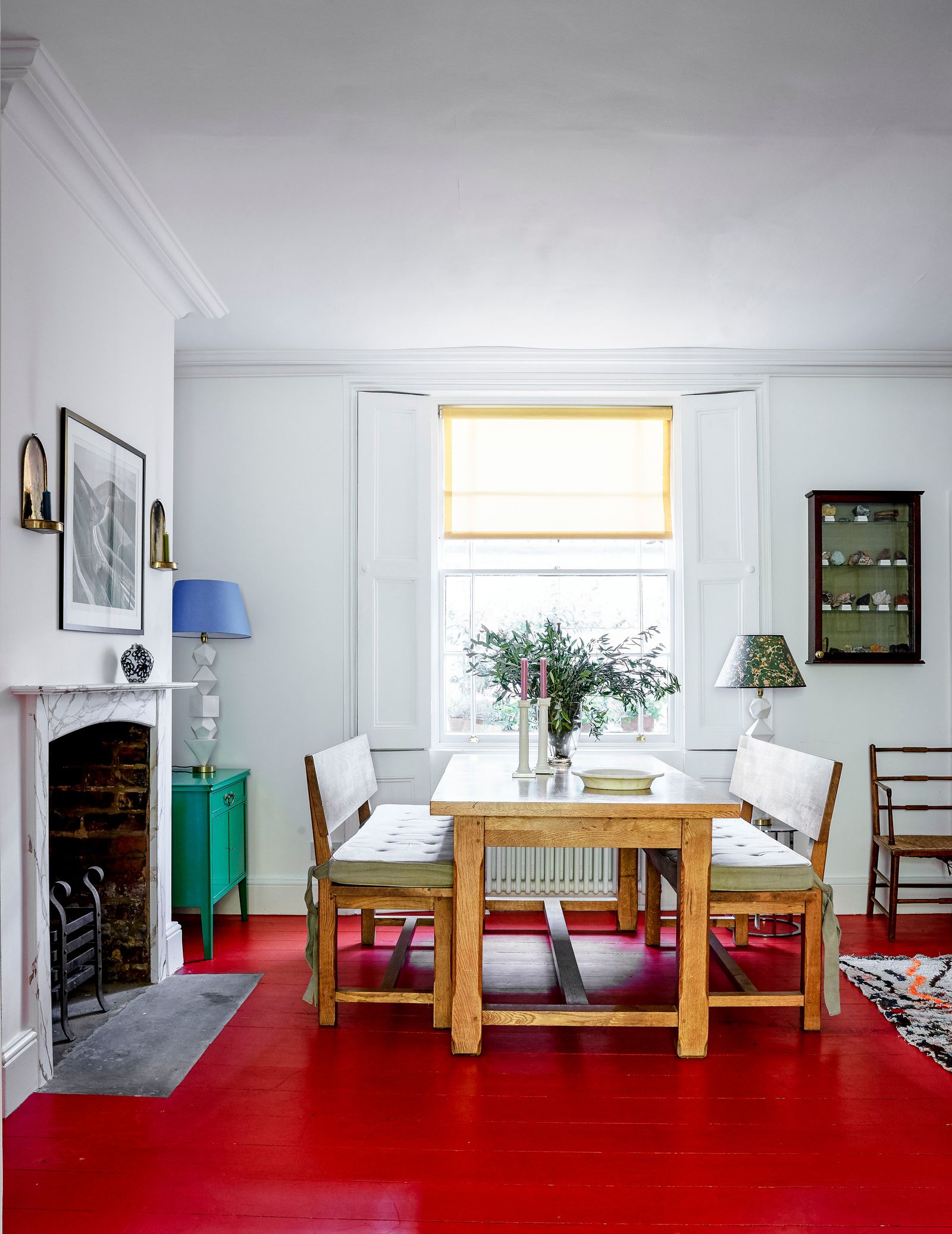 Image may contain Home Decor Furniture Table Architecture Building Dining Room Dining Table Indoors Room and Lamp