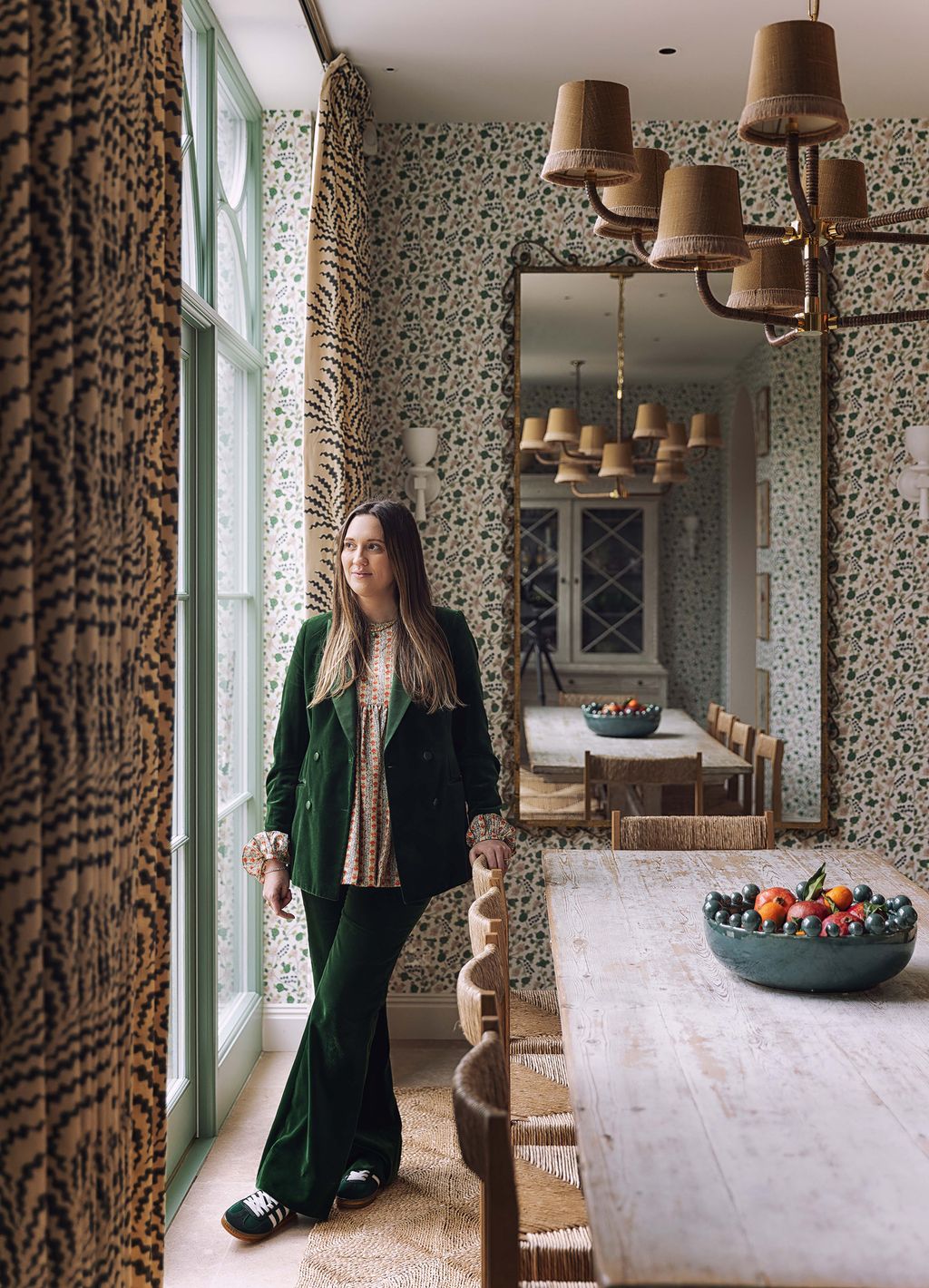 Image may contain Architecture Building Dining Room Dining Table Furniture Indoors Room Table Adult and Person