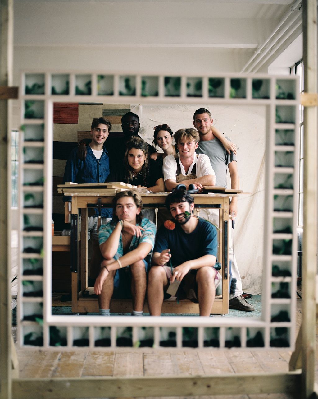 Image may contain Photography Face Head Person Portrait People Clothing Footwear Shoe Adult Wood and Accessories