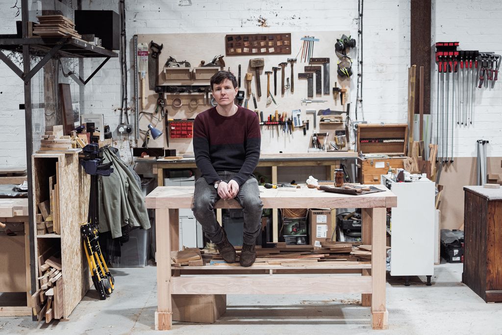 Image may contain Architecture Building Factory Manufacturing Workshop Adult Person Wristwatch and Clothing