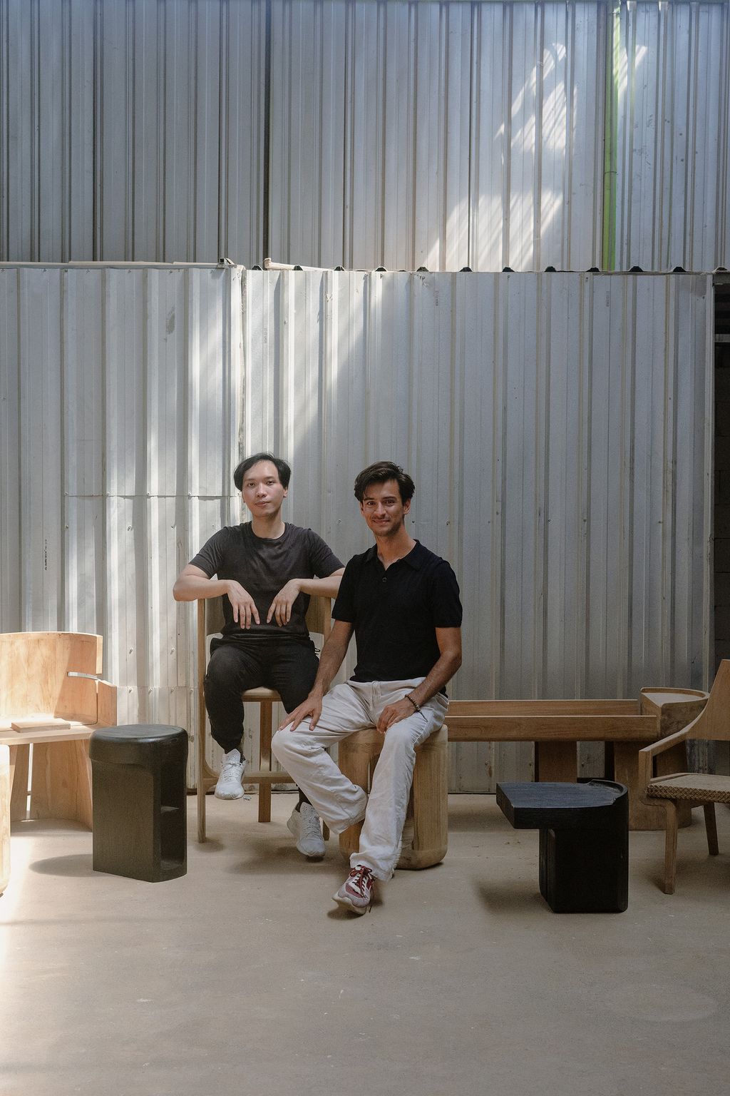 Image may contain Clothing Pants Face Head Person Photography Portrait Footwear Shoe Adult Plywood and Wood