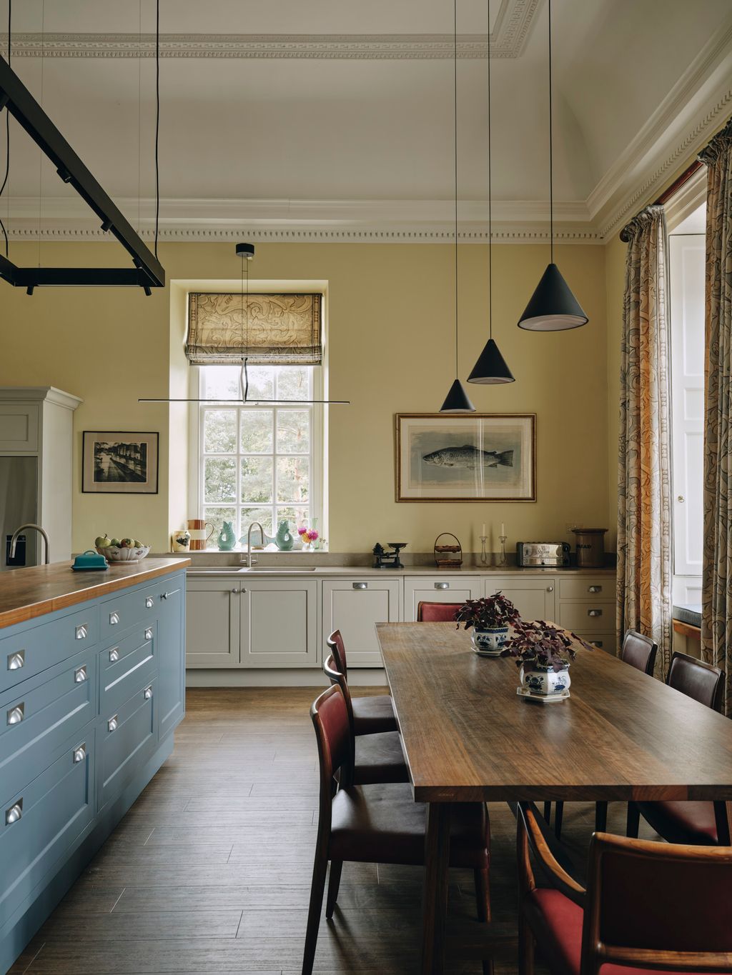 Image may contain Indoors Interior Design Architecture Building Dining Room Dining Table Furniture Room and Table