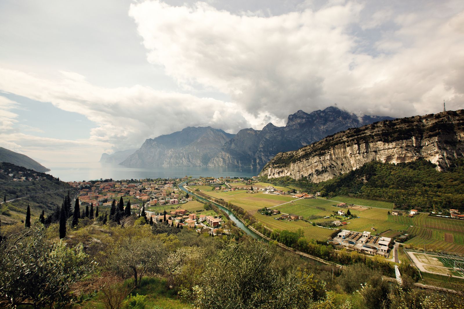 Image may contain Landscape Nature Outdoors Scenery Plateau Grass Plant Mountain Mountain Range Peak and Cloud