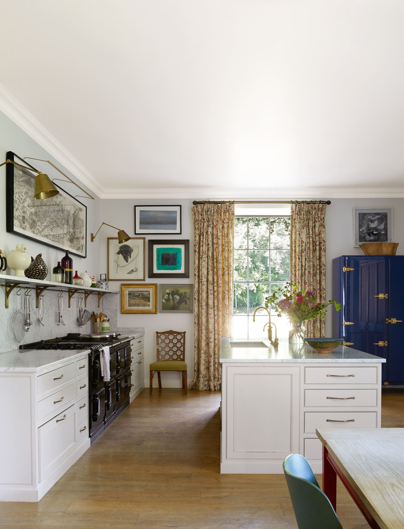 Image may contain Indoors Interior Design Chair Furniture Kitchen Lamp Sink Sink Faucet Home Decor and Art