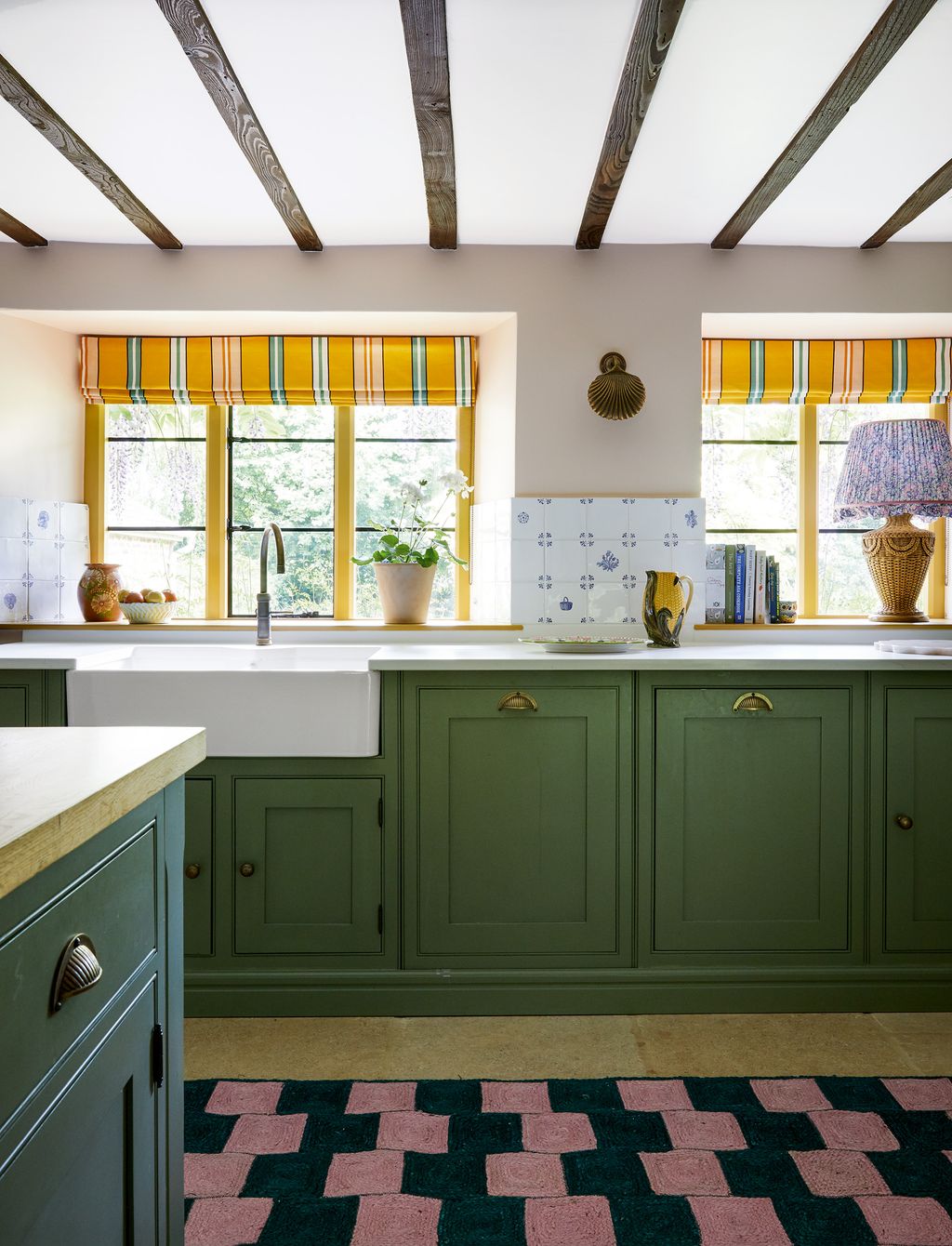 Image may contain Home Decor Rug Indoors Interior Design Kitchen Lamp Sink Sink Faucet and Plate