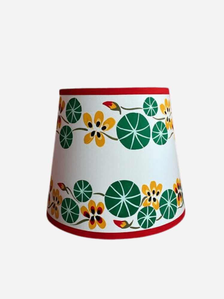 Image may contain: Lamp, Lampshade, and Cup